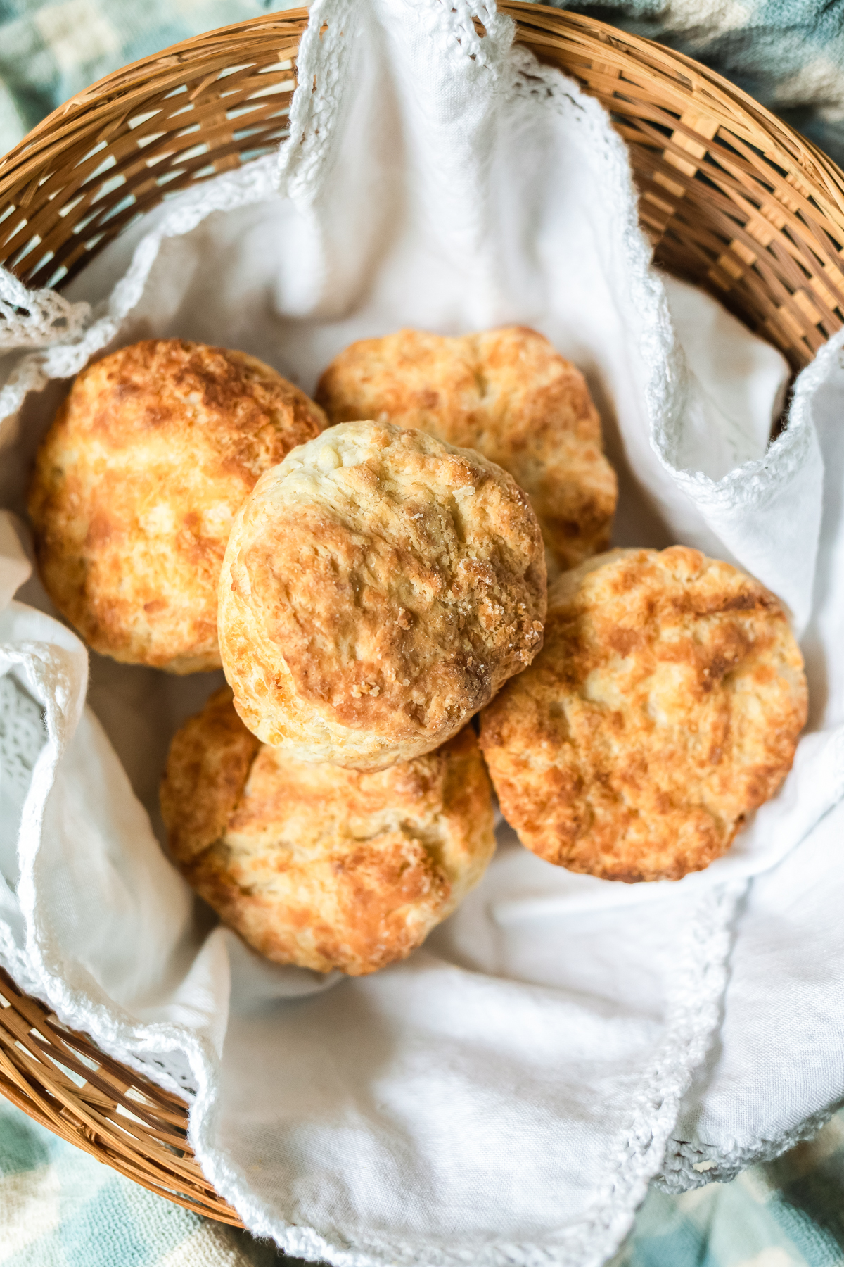 Fluffy biscuits made in the air fryer in a basket