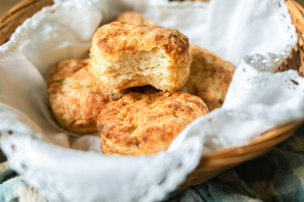 homemade biscuits made in the air fryer placed in a serving basket
